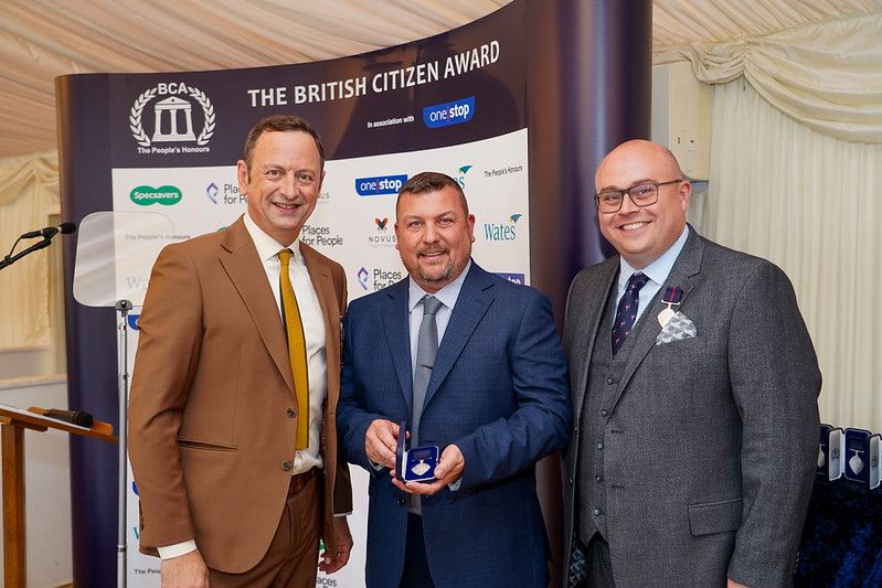 Joe Roussel receiving British Citizen Award